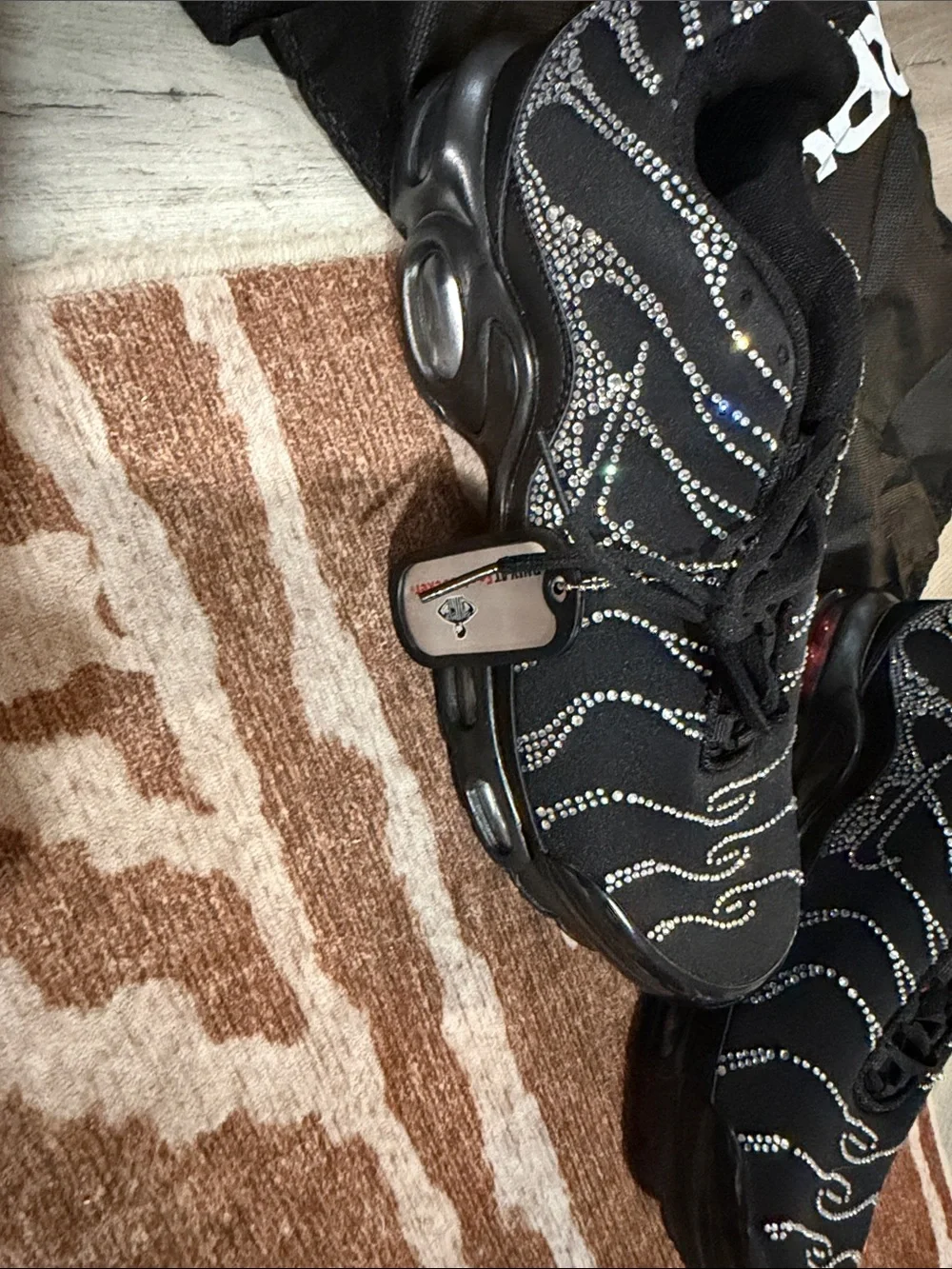 Nike Black Sneakers with Reflective Dot Wave Accents
